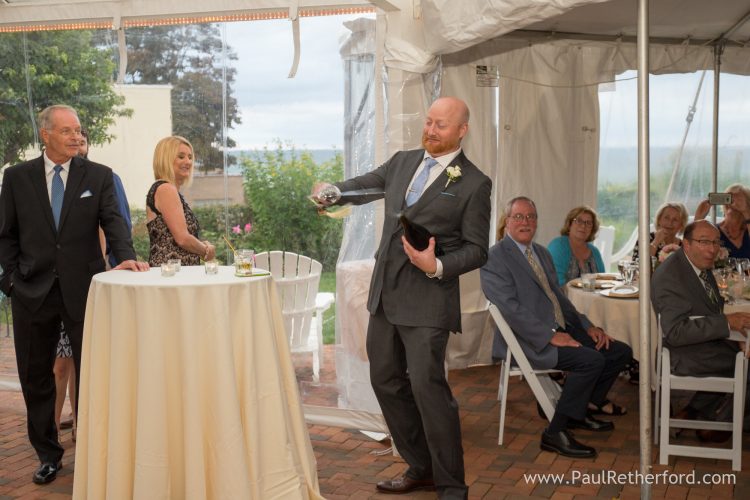 slicing top champagne bottle sword photo