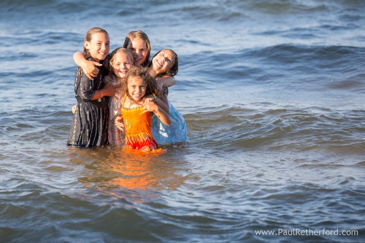 kids having fun water family photo