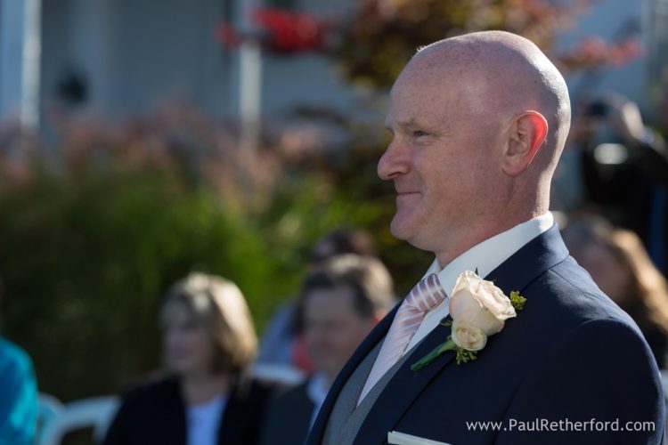 groom seeing bride first time photo