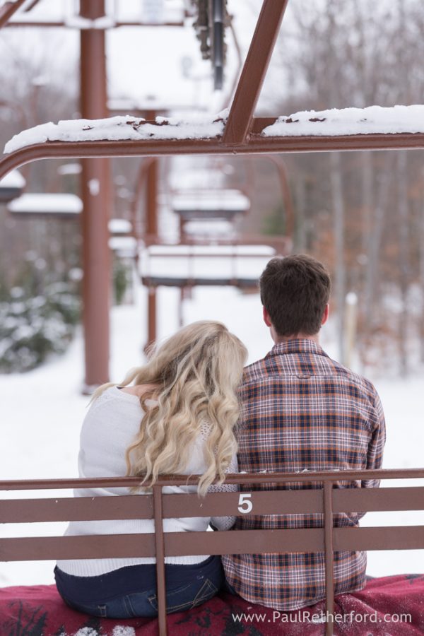 ski lift winter engagement photo