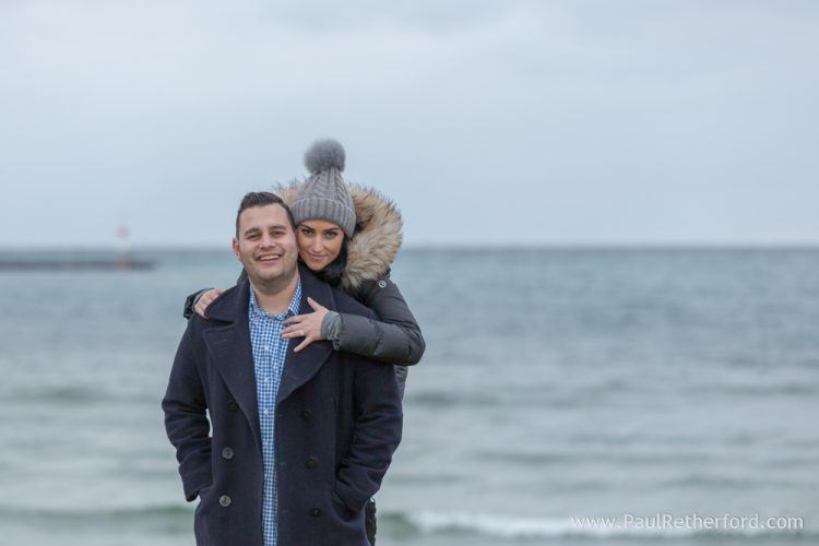 Surprise Engagement Petoskey Northern Michigan pier breakwall lighthouse photography