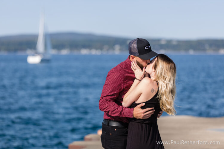 Surprise Engagement Petoskey Northern Michigan breakwall lighthouse Bayfront Park Photography