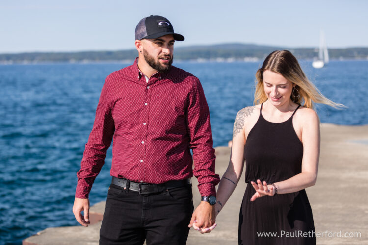 Surprise Engagement Petoskey Northern Michigan breakwall lighthouse Bayfront Park Photography