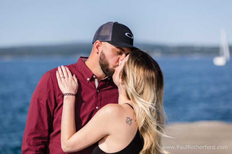 Surprise Engagement Petoskey Northern Michigan breakwall lighthouse Bayfront Park Photography
