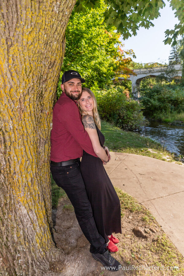 Surprise Engagement Petoskey Northern Michigan breakwall lighthouse Bayfront Park Photography