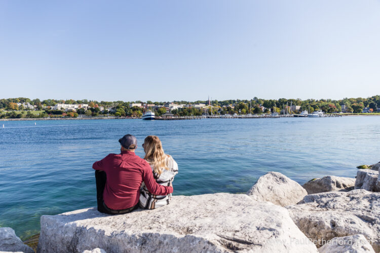 Surprise Engagement Petoskey Northern Michigan breakwall lighthouse Bayfront Park Photography