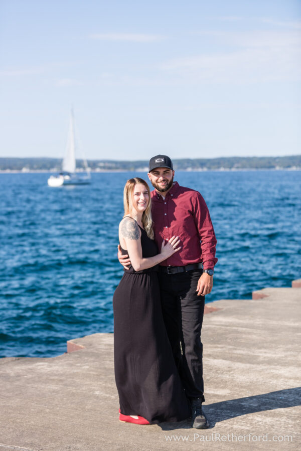 Surprise Engagement Petoskey Northern Michigan breakwall lighthouse Bayfront Park Photography